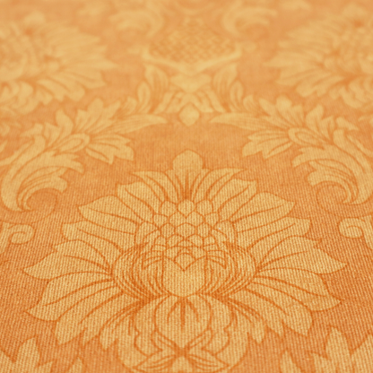 A bright apricot-orange damask fabric with a large-scale, repeating floral and acanthus leaf pattern in a soft tonal colourway.
