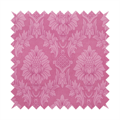 Vibrant magenta damask fabric featuring a large-scale, repeating floral and acanthus leaf pattern in a tonal, hot pink colourway.