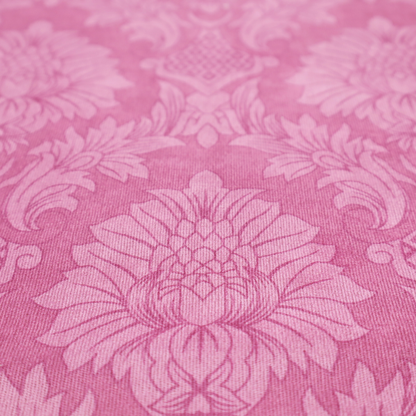 Vibrant magenta damask fabric featuring a large-scale, repeating floral and acanthus leaf pattern in a tonal, hot pink colourway.
