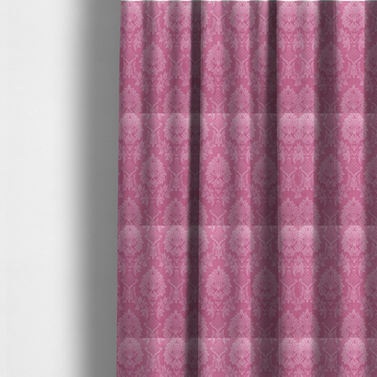 The fabric used to create these made-to-measure curtains is a vibrant magenta damask fabric featuring a large-scale, repeating floral and acanthus leaf pattern in a tonal, hot pink colourway.
