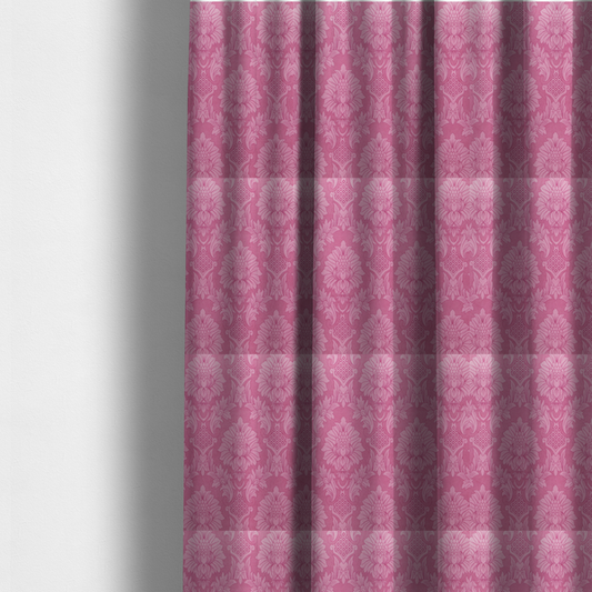 The fabric used to create these made-to-measure curtains is a vibrant magenta damask fabric featuring a large-scale, repeating floral and acanthus leaf pattern in a tonal, hot pink colourway.