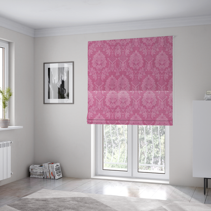 The fabric used to create these Roman blinds is a vibrant magenta damask fabric featuring a large-scale, repeating floral and acanthus leaf pattern in a tonal, hot pink colourway.