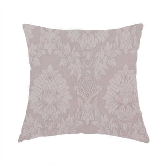 The fabric used to create this handmade cushion is a subtle champagne and taupe damask fabric featuring a large-scale, repeating floral medallion pattern in a soft, shimmering tonal colourway.