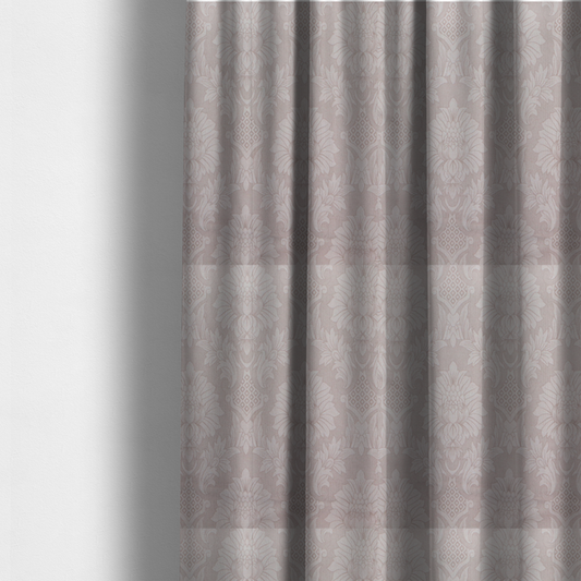 The fabric used to create these made-to-measure curtains is a subtle champagne and taupe damask fabric featuring a large-scale, repeating floral medallion pattern in a soft, shimmering tonal colourway.