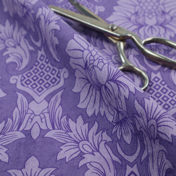 Regal royal purple damask fabric featuring a large-scale, repeating floral and acanthus leaf pattern in a shimmering tonal violet colourway.