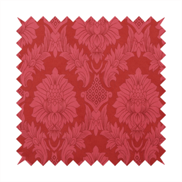 Rich crimson red damask fabric featuring a large-scale, repeating floral and acanthus leaf pattern in a shimmering tonal colourway.
