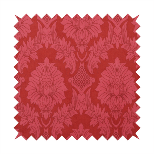 Rich crimson red damask fabric featuring a large-scale, repeating floral and acanthus leaf pattern in a shimmering tonal colourway.