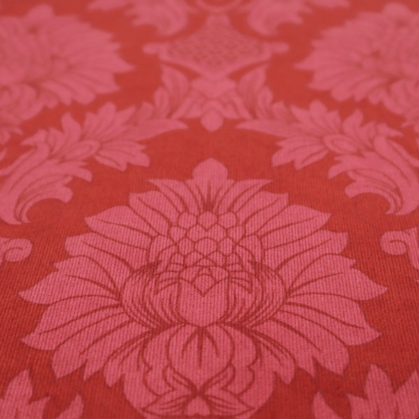 Rich crimson red damask fabric featuring a large-scale, repeating floral and acanthus leaf pattern in a shimmering tonal colourway.