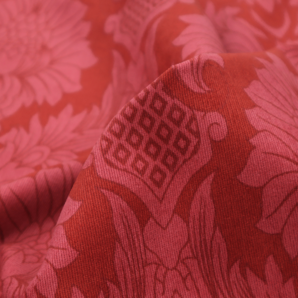 Rich crimson red damask fabric featuring a large-scale, repeating floral and acanthus leaf pattern in a shimmering tonal colourway.