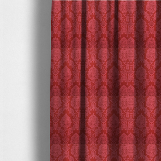 The fabric used to create these made-to-measure curtains is a rich crimson red damask fabric featuring a large-scale, repeating floral and acanthus leaf pattern in a shimmering tonal colourway.