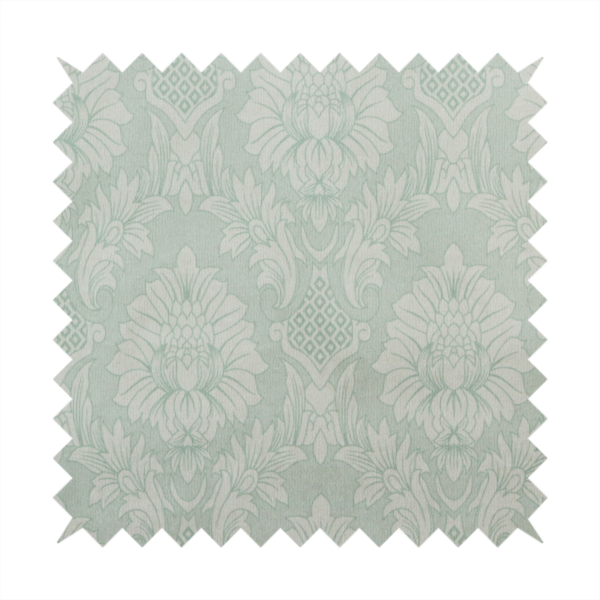 Elegant pale grey damask fabric featuring a large-scale, repeating floral medallion pattern in shimmering silvery-white tones.