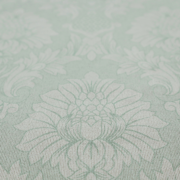 Elegant pale grey damask fabric featuring a large-scale, repeating floral medallion pattern in shimmering silvery-white tones.