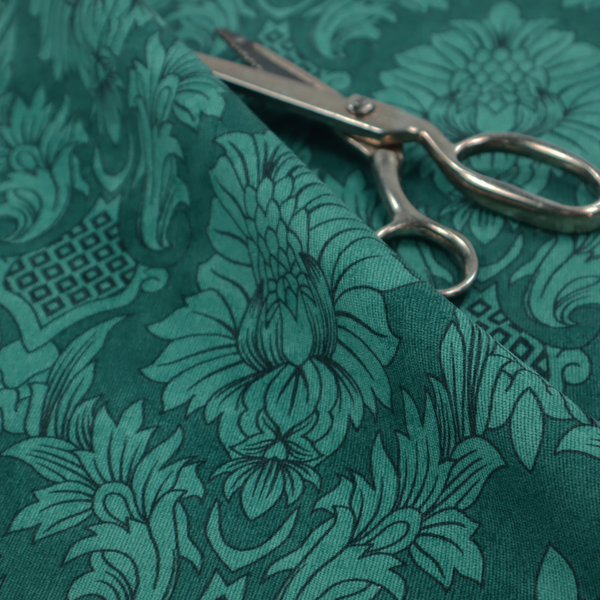 Deep peacock teal damask fabric featuring a large-scale, repeating floral and acanthus leaf pattern in a rich, shimmering tonal colourway.