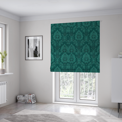 The fabric used to create these Roman blinds is a deep peacock teal damask fabric featuring a large-scale, repeating floral and acanthus leaf pattern in a rich, shimmering tonal colourway.