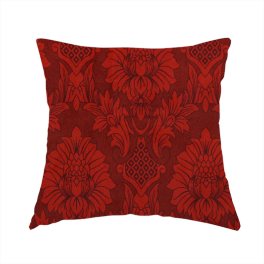 The fabric used to create this handmade cushion is a deep burgundy damask fabric featuring a large-scale, repeating floral and acanthus leaf pattern in a dark, shimmering tonal colourway.