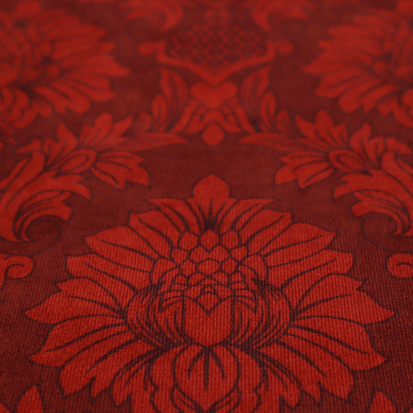 Deep burgundy damask fabric featuring a large-scale, repeating floral and acanthus leaf pattern in a dark, shimmering tonal colourway.
