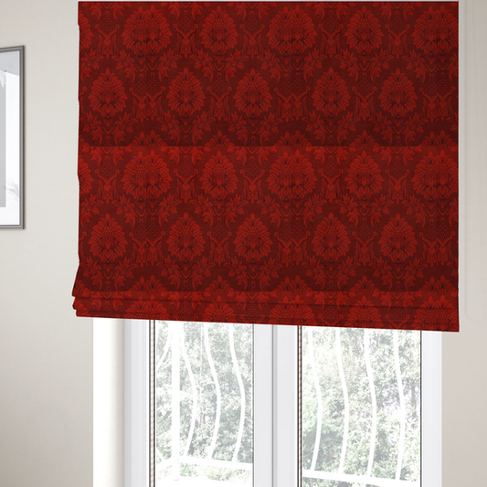 The fabric used to create these Roman blinds is a deep burgundy damask fabric featuring a large-scale, repeating floral and acanthus leaf pattern in a dark, shimmering tonal colourway.