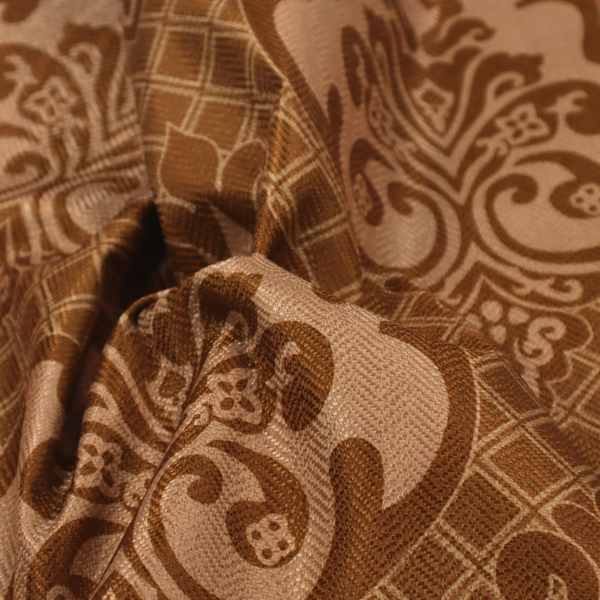 A repeating damask pattern in warm shades of copper, cocoa, and tan. Large, ornate floral medallions featuring stylized acanthus leaves and small blossoms are arranged in an alternating grid.