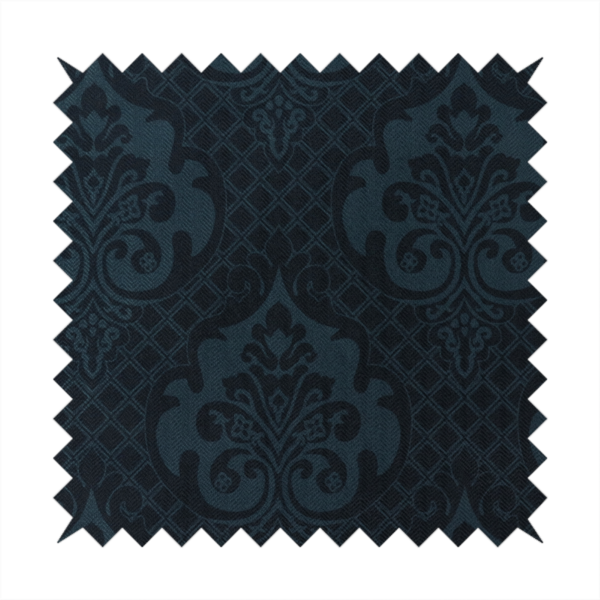 A charcoal damask fabric with a rich, moody aesthetic. The pattern features large, intricate floral medallions and acanthus leaf scrolls in a dark teal hue, set against a slightly darker, nearly black background. A fine diagonal lattice grid fills the spaces between the motifs, and the material displays a clear, woven texture that adds depth to the monochrome design.