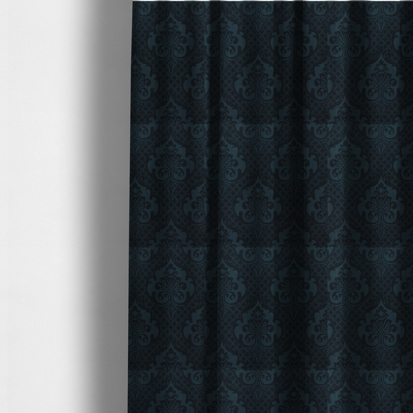 The fabric used to create these made-to-measure curtains is a charcoal damask fabric with a rich, moody aesthetic. The pattern features large, intricate floral medallions and acanthus leaf scrolls in a dark teal hue, set against a slightly darker, nearly black background. A fine diagonal lattice grid fills the spaces between the motifs, and the material displays a clear, woven texture that adds depth to the monochrome design.