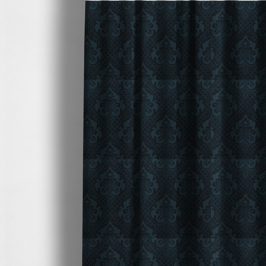 The fabric used to create these made-to-measure curtains is a charcoal damask fabric with a rich, moody aesthetic. The pattern features large, intricate floral medallions and acanthus leaf scrolls in a dark teal hue, set against a slightly darker, nearly black background. A fine diagonal lattice grid fills the spaces between the motifs, and the material displays a clear, woven texture that adds depth to the monochrome design.