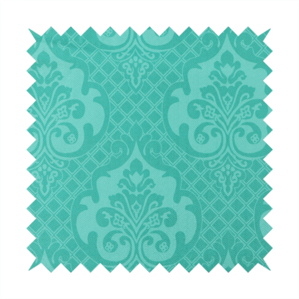 The design features large, ornate floral medallions and scrolling acanthus leaves in a bright turquoise shade, set against a slightly lighter mint green background. A fine diagonal lattice grid fills the background between the motifs, and the material shows a clear woven texture that provides visual depth to the tonal design.