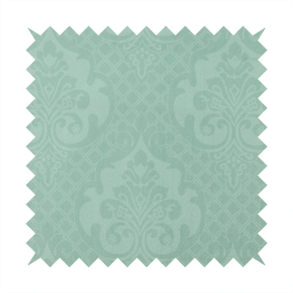 The design consists of large, ornate floral medallions and scrolling acanthus leaves woven in a shade very close to the background colour, creating a delicate, shimmering effect. A fine diagonal lattice grid fills the background between the motifs, and the material displays a clear woven texture throughout.