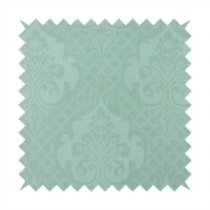 The design consists of large, ornate floral medallions and scrolling acanthus leaves woven in a shade very close to the background colour, creating a delicate, shimmering effect. A fine diagonal lattice grid fills the background between the motifs, and the material displays a clear woven texture throughout.
