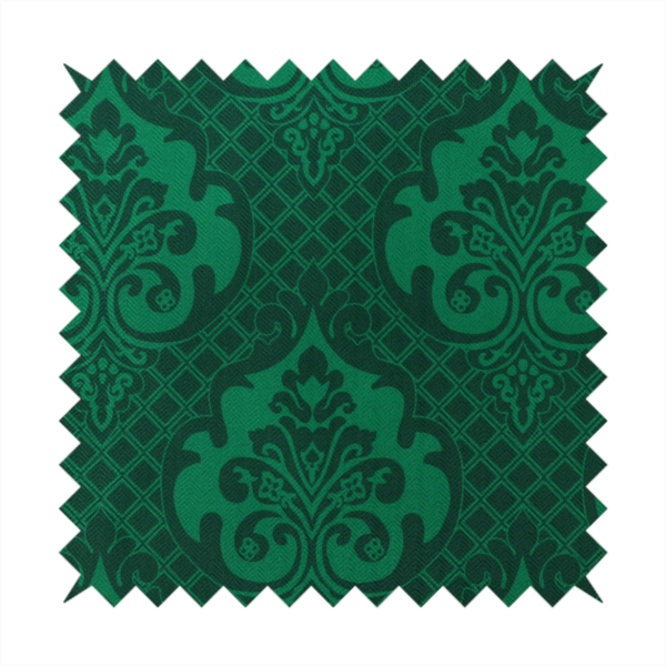 The design showcases large, ornate floral medallions and scrolling acanthus leaves in a vibrant green hue, set against a darker, forest green background. A fine diagonal lattice grid creates a diamond pattern in the spaces between the motifs, and the material displays a distinct woven texture that adds depth and classic character to the design.