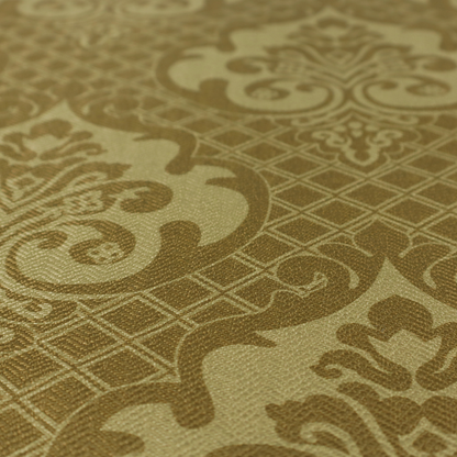 The design showcases large, ornate floral medallions and scrolling acanthus leaves in a muted tan shade, set against a rich ochre background. A fine diagonal lattice grid creates a diamond pattern in the spaces between the motifs, and the material displays a clear woven texture that adds depth and a subtle sheen to the pattern.