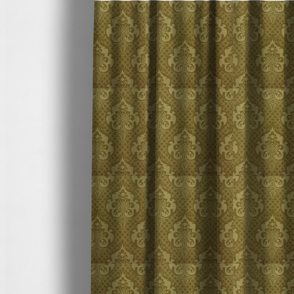 The fabric used to create these made-to-measure curtains has a design that showcases large, ornate floral medallions and scrolling acanthus leaves in a muted tan shade, set against a rich ochre background. A fine diagonal lattice grid creates a diamond pattern in the spaces between the motifs, and the material displays a clear woven texture that adds depth and a subtle sheen to the pattern.