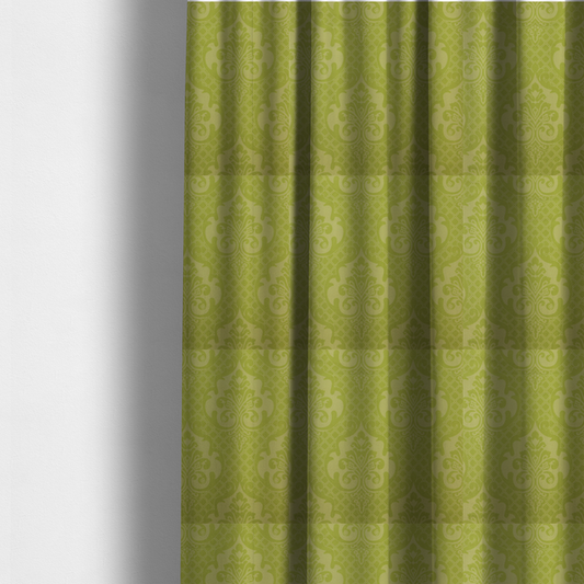 The fabric used to create these made-to-measure curtains has a lime green damask pattern on a textured fabric. The design features large, ornate floral medallions with stylized acanthus leaves, arranged in a repeating grid.