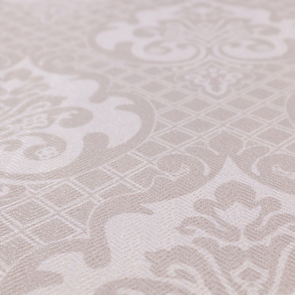 A baby pink and cream damask pattern on a textured fabric. The design features large, ornate floral medallions with stylized acanthus leaf scrolls, arranged in a structured, repeating grid.