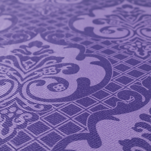 The design features large, ornate floral medallions and scrolling acanthus leaves in a lighter violet shade, set against a deep, saturated purple background. A fine diagonal lattice grid fills the background between the motifs, and the material displays a clear woven texture that adds structural depth and a sophisticated sheen to the tonal design.