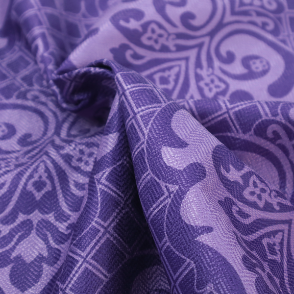 The design features large, ornate floral medallions and scrolling acanthus leaves in a lighter violet shade, set against a deep, saturated purple background. A fine diagonal lattice grid fills the background between the motifs, and the material displays a clear woven texture that adds structural depth and a sophisticated sheen to the tonal design.