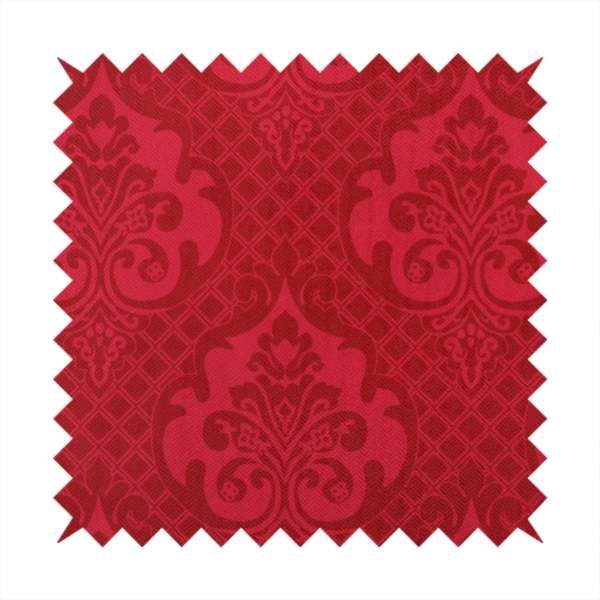 The design features large, ornate floral medallions and scrolling acanthus leaves in a slightly lighter shade of red, creating a tonal, high-contrast effect. A fine diagonal lattice grid fills the background between the motifs, and the material shows a clear woven texture that adds depth and a traditional feel to the design.