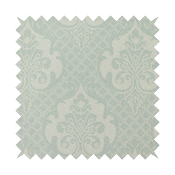 The design showcases large, ornate floral medallions and scrolling acanthus leaves in a light silver shade, set against a slightly darker grey-white background. A fine diagonal lattice grid creates a diamond pattern in the negative space between the motifs, and the material displays a clear woven texture that adds a sophisticated, metallic-like shimmer to the pattern.