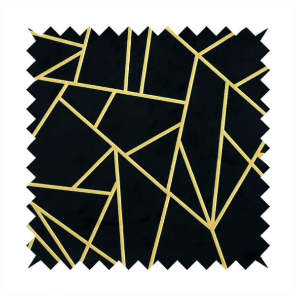 A close-up of a high-contrast black and gold fabric featuring a fractured, geometric mosaic design. The deep, matte black background is intersected by a network of sharp, metallic gold lines that form irregular, angular polygons. The pattern resembles a web of shimmering gold veins or a stylized shattered-glass effect, giving the textile a luxurious, Art Deco-inspired aesthetic.