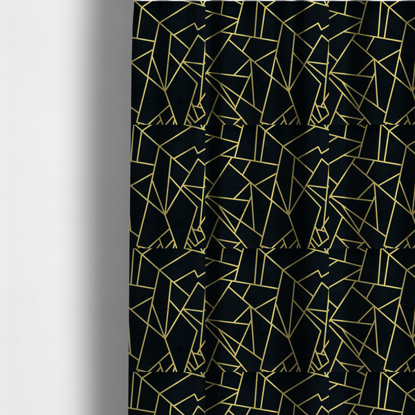 The fabric used to create these made-to-measure curtains is a high-contrast black and gold fabric featuring a fractured, geometric mosaic design. The deep, matte black background is intersected by a network of sharp, metallic gold lines that form irregular, angular polygons. The pattern resembles a web of shimmering gold veins or a stylized shattered-glass effect, giving the textile a luxurious, Art Deco-inspired aesthetic.