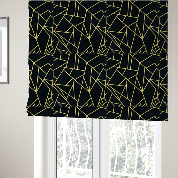 The fabric used to create these Roman blinds is  a high-contrast black and gold fabric featuring a fractured, geometric mosaic design. The deep, matte black background is intersected by a network of sharp, metallic gold lines that form irregular, angular polygons. The pattern resembles a web of shimmering gold veins or a stylized shattered-glass effect, giving the textile a luxurious, Art Deco-inspired aesthetic.