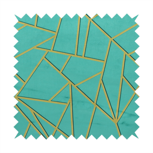 A close-up of a luxurious teal or bright turquoise fabric featuring a fractured, geometric mosaic pattern. The vibrant, plush background is divided by a network of shimmering metallic gold lines that form sharp, irregular polygons. The design creates a striking shattered-glass or "cracked ice" effect, blending a high-energy jewel tone with sophisticated, Art Deco-inspired gold linework for a modern, architectural look.
