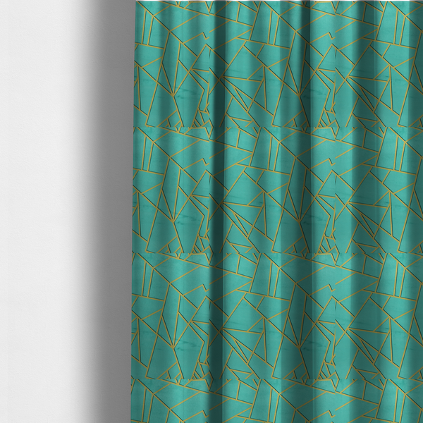 The fabric used to create these made-to-measure curtains is a luxurious teal or bright turquoise fabric featuring a fractured, geometric mosaic pattern. The vibrant, plush background is divided by a network of shimmering metallic gold lines that form sharp, irregular polygons. The design creates a striking shattered-glass or "cracked ice" effect, blending a high-energy jewel tone with sophisticated, Art Deco-inspired gold linework for a modern, architectural look.