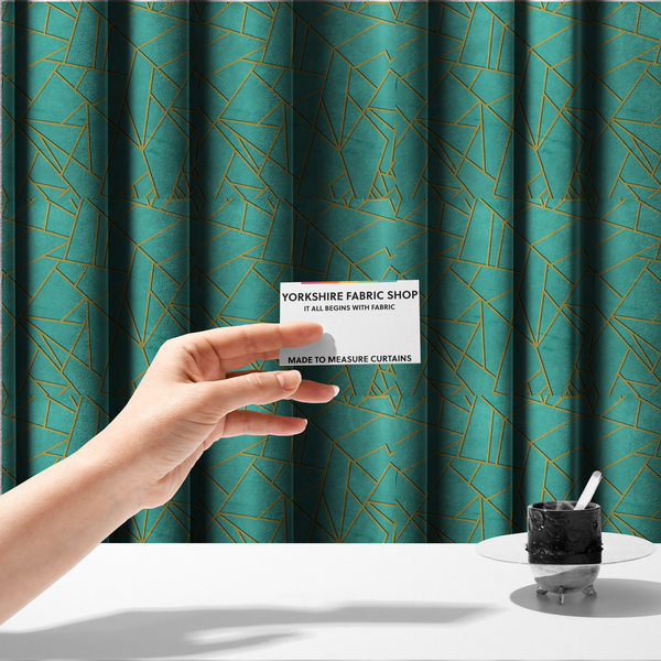 The fabric used to create these made-to-measure curtains is a luxurious teal or bright turquoise fabric featuring a fractured, geometric mosaic pattern. The vibrant, plush background is divided by a network of shimmering metallic gold lines that form sharp, irregular polygons. The design creates a striking shattered-glass or "cracked ice" effect, blending a high-energy jewel tone with sophisticated, Art Deco-inspired gold linework for a modern, architectural look.