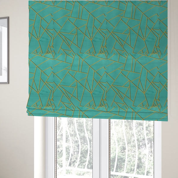 The fabric used to create these Roman blinds is a luxurious teal or bright turquoise fabric featuring a fractured, geometric mosaic pattern. The vibrant, plush background is divided by a network of shimmering metallic gold lines that form sharp, irregular polygons. The design creates a striking shattered-glass or "cracked ice" effect, blending a high-energy jewel tone with sophisticated, Art Deco-inspired gold linework for a modern, architectural look.
