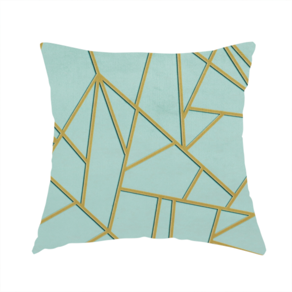 The fabric used to create this handmade cushion is a luxurious light aqua or pale sky blue fabric featuring a fractured, geometric mosaic pattern. The soft, matte background is segmented by a network of embossed metallic gold lines that create sharp, irregular polygons. This "cracked ice" or shattered-glass effect pairs a serene, cool-toned pastel with warm, shimmering gold linework for a sophisticated and modern Art Deco-inspired look.