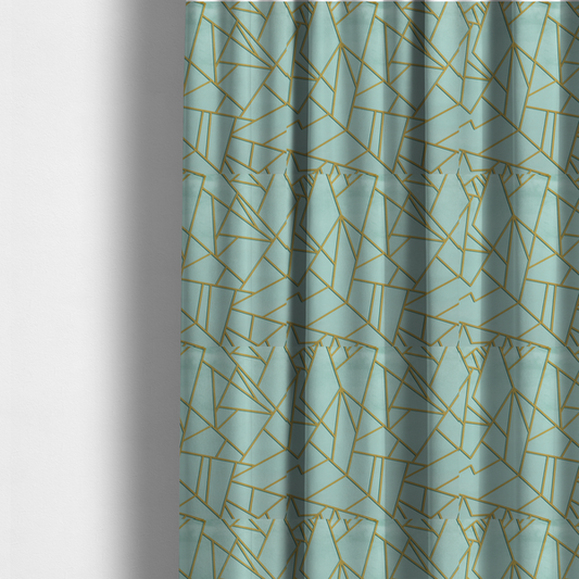 The fabric used to create these made-to-measure curtains is a luxurious light aqua or pale sky blue fabric featuring a fractured, geometric mosaic pattern. The soft, matte background is segmented by a network of embossed metallic gold lines that create sharp, irregular polygons. This "cracked ice" or shattered-glass effect pairs a serene, cool-toned pastel with warm, shimmering gold linework for a sophisticated and modern Art Deco-inspired look.