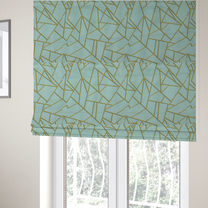 The fabric used to create these Roman blinds is a luxurious light aqua or pale sky blue fabric featuring a fractured, geometric mosaic pattern. The soft, matte background is segmented by a network of embossed metallic gold lines that create sharp, irregular polygons. This "cracked ice" or shattered-glass effect pairs a serene, cool-toned pastel with warm, shimmering gold linework for a sophisticated and modern Art Deco-inspired look.