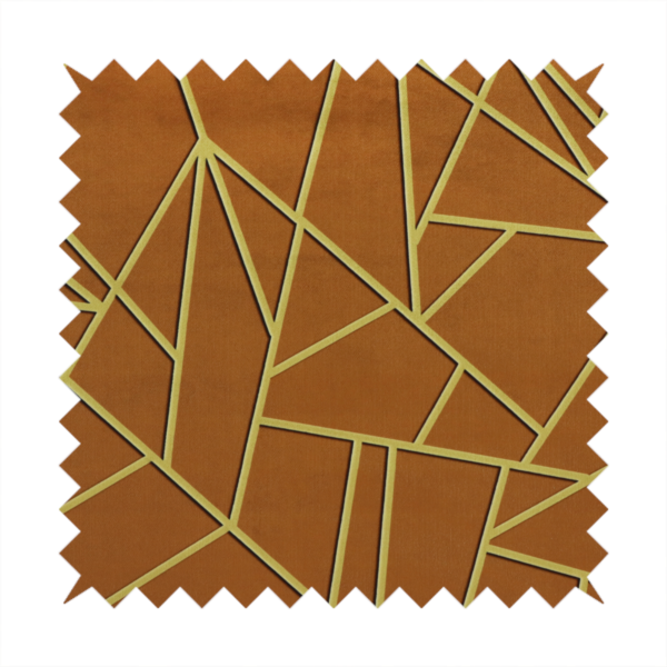 A close-up of a luxurious brown or rust-coloured fabric featuring a fractured, geometric mosaic pattern. The warm, matte background is divided by a network of recessed gold metallic lines that form sharp, irregular polygons. This "cracked ice" or shattered-glass effect creates a bold, architectural look, blending the deep, earthy tones of the textile with shimmering, Art Deco-inspired accents.