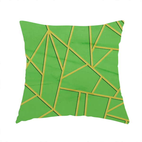 The fabric used to create this handmade cushion is a vibrant bright green fabric featuring a fractured, geometric mosaic pattern. The lively, matte background is segmented by a network of recessed metallic gold lines that form sharp, irregular polygons. This "cracked ice" or shattered-glass effect creates a bold, modern look, combining a lush, verdant base with shimmering, Art Deco-inspired accents.