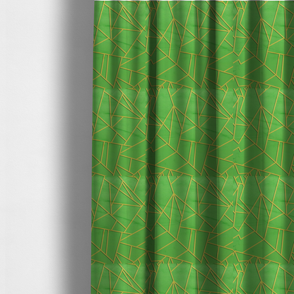 The fabric used to create these made-to-measure curtains is a vibrant bright green fabric featuring a fractured, geometric mosaic pattern. The lively, matte background is segmented by a network of recessed metallic gold lines that form sharp, irregular polygons. This "cracked ice" or shattered-glass effect creates a bold, modern look, combining a lush, verdant base with shimmering, Art Deco-inspired accents.